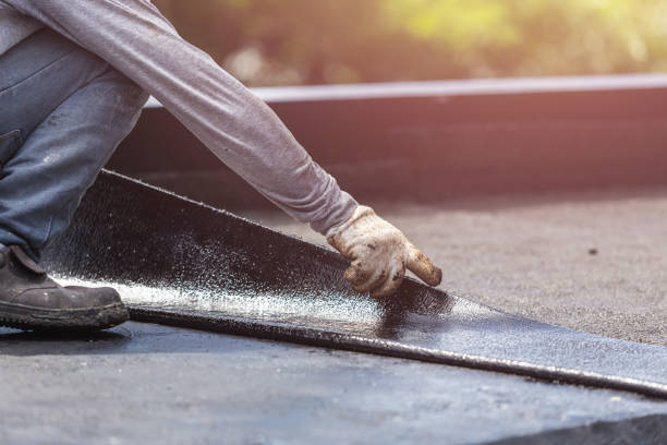 Professional Basement Waterproofing technician working in Wyandanch, NY
